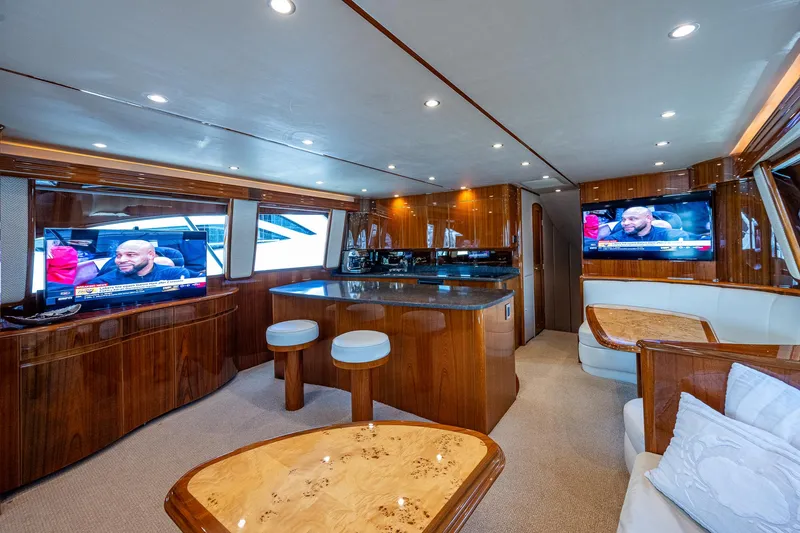Gypsea Yacht Photos Pics Luxurious interior of 2015 Viking 66 Open yacht with modern amenities and elegant wood finishes.