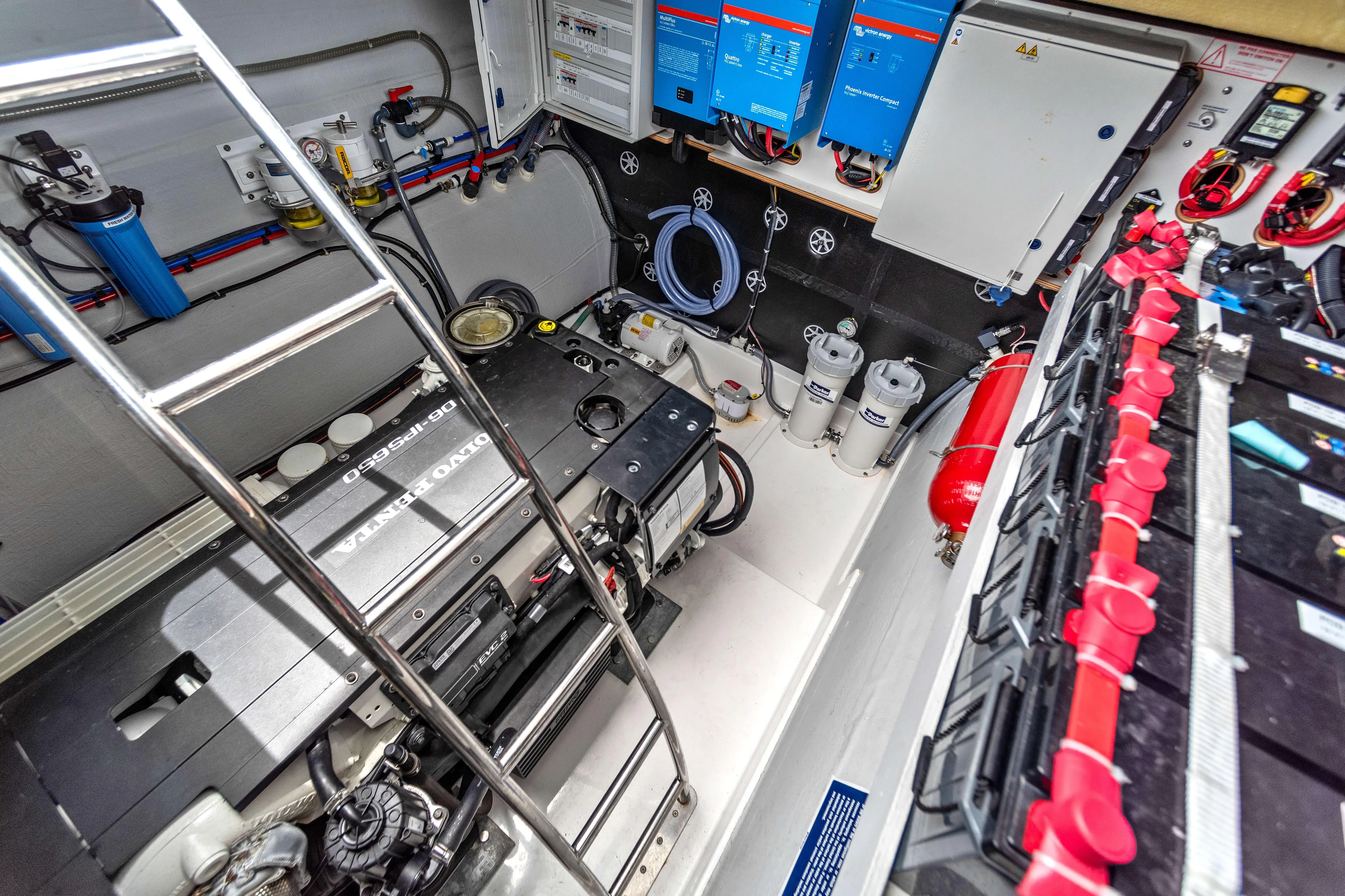 Mona Lisa Yacht Photos Pics Engine room of 2024 Fountaine Pajot MY.6 yacht with Volvo Penta engine and electrical systems.