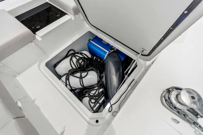 Mona Lisa Yacht Photos Pics Storage compartment on 2024 Fountaine Pajot MY.6 yacht with ropes and fenders.