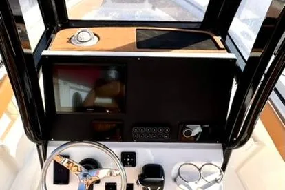  Yacht Photos Pics Helm of 2026 Key West 239 FSR boat with modern controls and steering wheel.