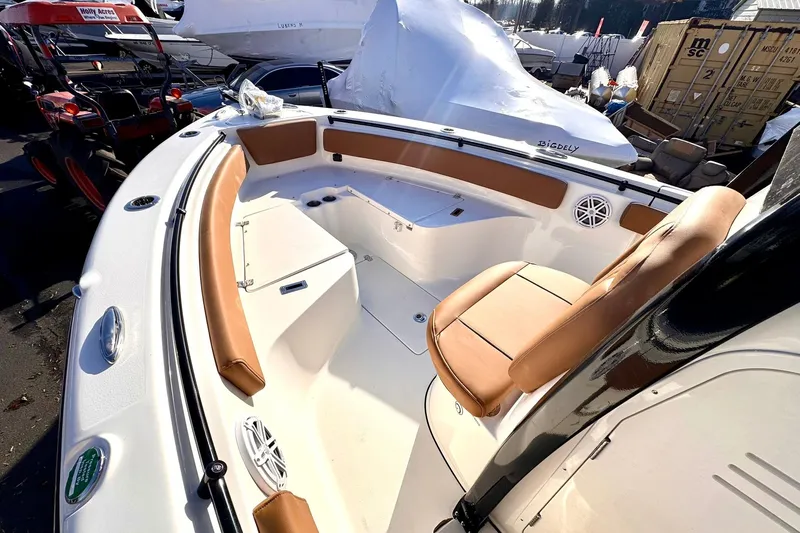 Yacht Photos Pics 2026 Key West 239 FSR boat interior with tan seating and modern design.