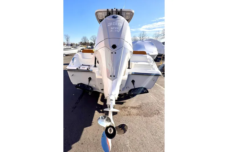  Yacht Photos Pics 2026 Key West 239 FSR boat with powerful 350 V8 engine, parked outdoors.