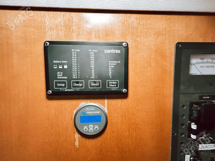 Kansakota Winds Yacht Photos Pics Control panel of a 2003 Lagoon 410-S2 with Xantrex and Victron Energy displays.