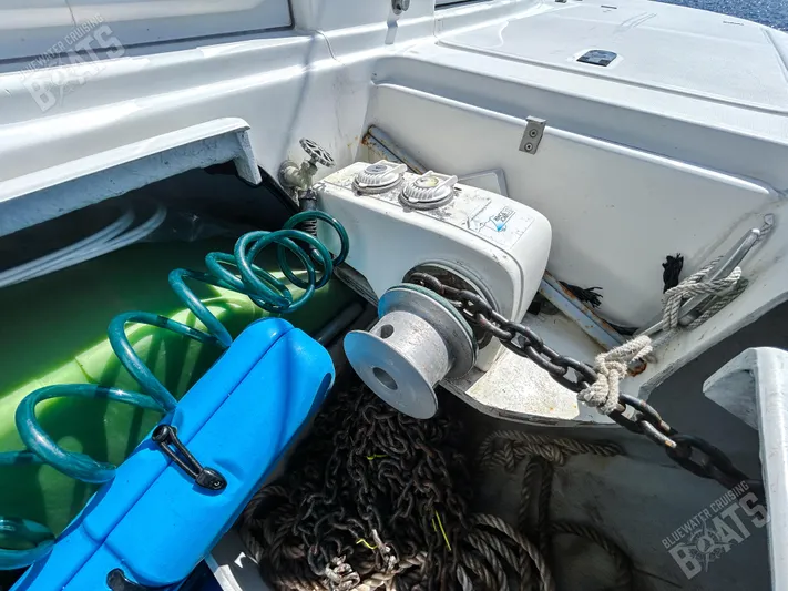 Kansakota Winds Yacht Photos Pics Anchor winch and chain on a 2003 Lagoon 410-S2 catamaran deck.