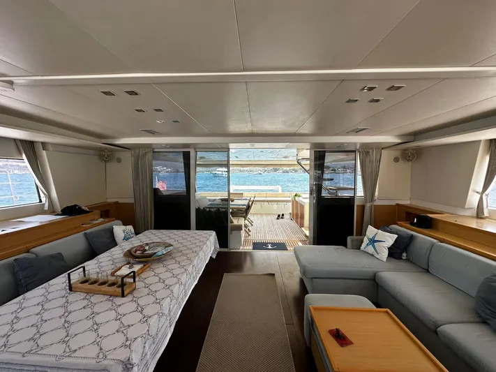  Yacht Photos Pics Luxurious interior of 2012 Lagoon 620 yacht with spacious seating and ocean view.