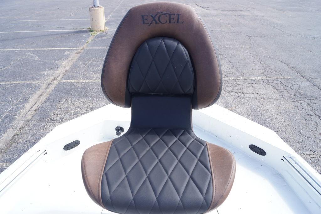 Luxurious seating on 2026 Excel 230 Bay Pro Elite boat, featuring diamond-stitched upholstery.