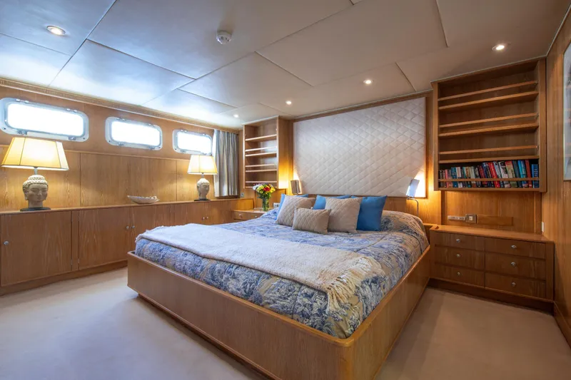 Monaco Yacht Photos Pics Luxurious bedroom on a 1982 Feadship Classic yacht.