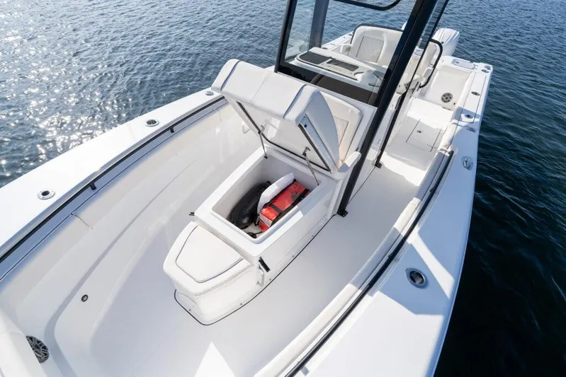  Yacht Photos Pics Manufacturer Provided Image: 2025 Sea Hunt Gamefish 27 Coffin Box boat with open storage, on calm water.
