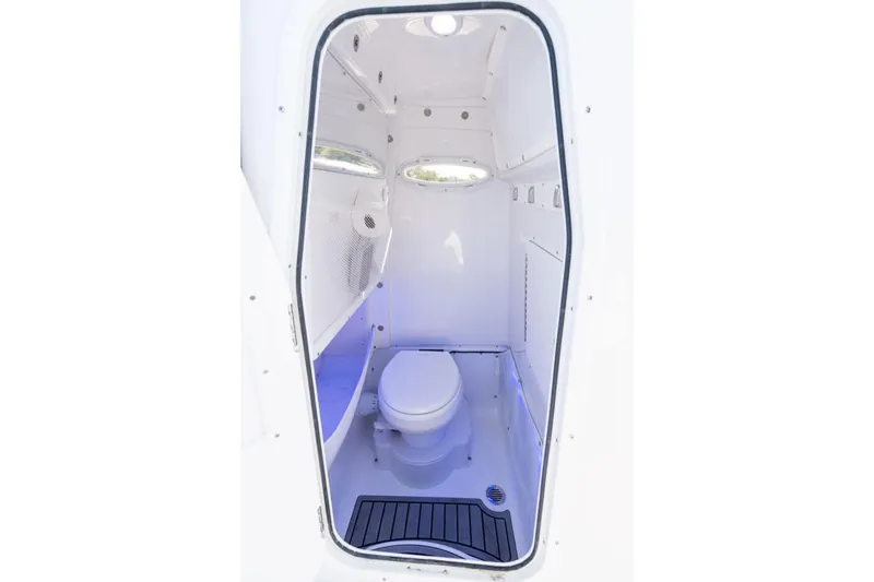  Yacht Photos Pics Manufacturer Provided Image: 2025 Sea Hunt Gamefish 27 Coffin Box interior with compact marine toilet.