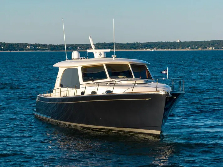 Satellite Yacht Photos Pics 2023 Eastbay EB60 yacht cruising on open water.