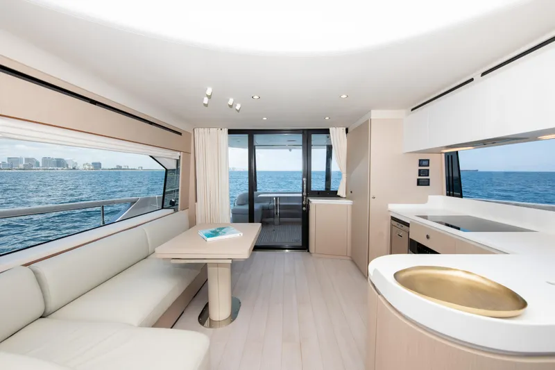 Crimson Yacht Photos Pics Luxurious interior of 2023 Azimut Fly 68 yacht with ocean view.