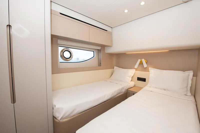 Crimson Yacht Photos Pics Luxurious twin cabin interior of 2023 Azimut Fly 68 yacht.