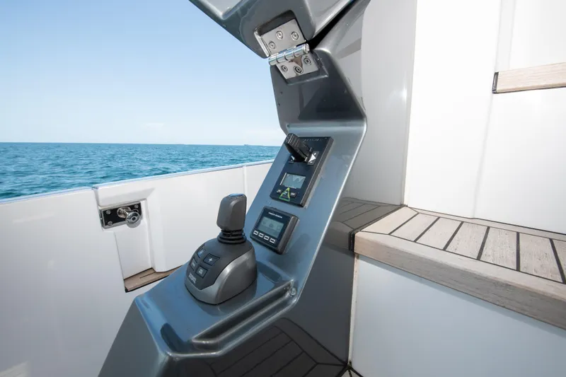 Crimson Yacht Photos Pics 2023 Azimut Fly 68 yacht control panel with ocean view.