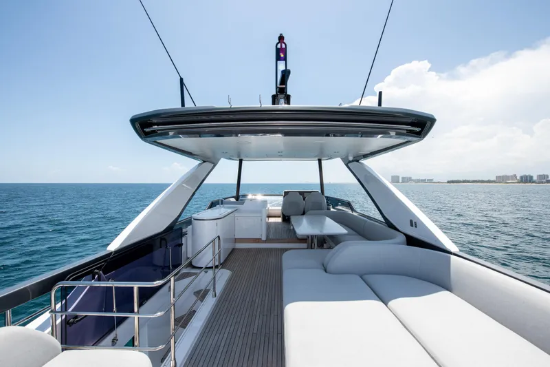 Crimson Yacht Photos Pics 2023 Azimut Fly 68 yacht, luxurious deck view on open sea.