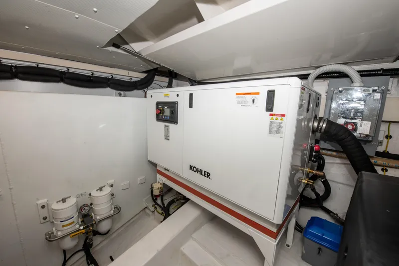 Crimson Yacht Photos Pics Engine room of 2023 Azimut Fly 68 yacht with Kohler generator.