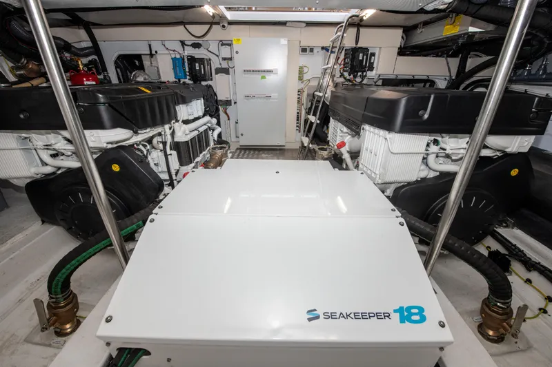 Crimson Yacht Photos Pics Engine room of 2023 Azimut Fly 68 yacht with Seakeeper 18 stabilizer.