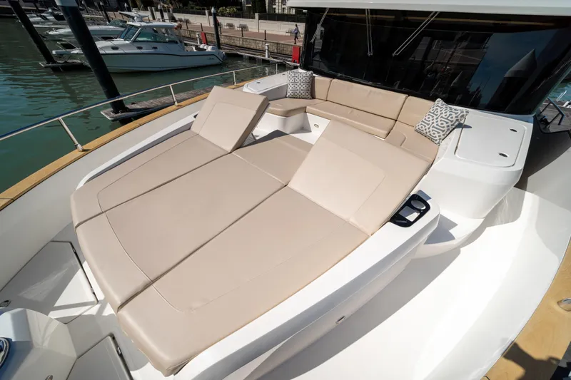 Forever Young Yacht Photos Pics Luxurious 2018 Absolute 58 Navetta yacht with spacious sunbathing area and elegant seating.