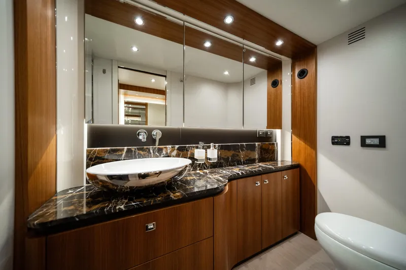 Forever Young Yacht Photos Pics Luxurious bathroom in 2018 Absolute 58 Navetta yacht with elegant wood and marble finishes.