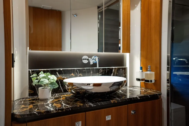 Forever Young Yacht Photos Pics Luxurious bathroom in 2018 Absolute 58 Navetta yacht with elegant marble countertop.