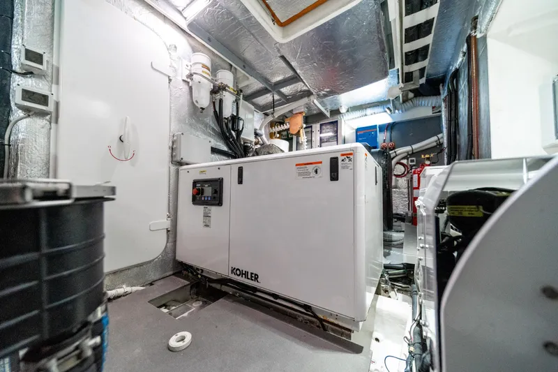 Forever Young Yacht Photos Pics Engine room of 2018 Absolute 58 Navetta yacht with Kohler generator.