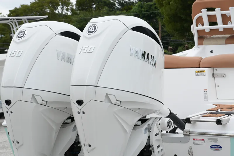  Yacht Photos Pics 2025 NauticStar 252 Legacy with dual Yamaha 150 engines, rear view.