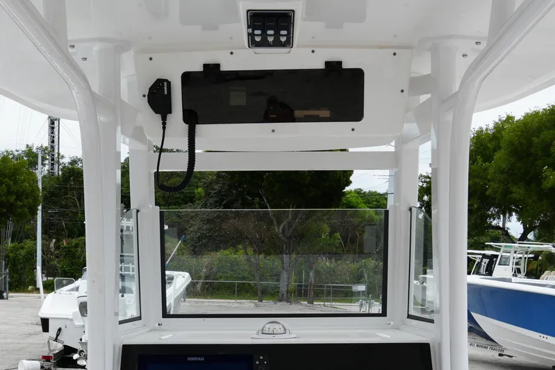  Yacht Photos Pics 2025 NauticStar 252 Legacy boat helm with modern controls and clear windshield.