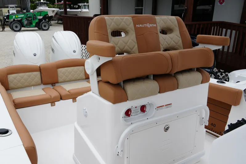  Yacht Photos Pics 2025 NauticStar 252 Legacy boat interior with tan and beige seating.