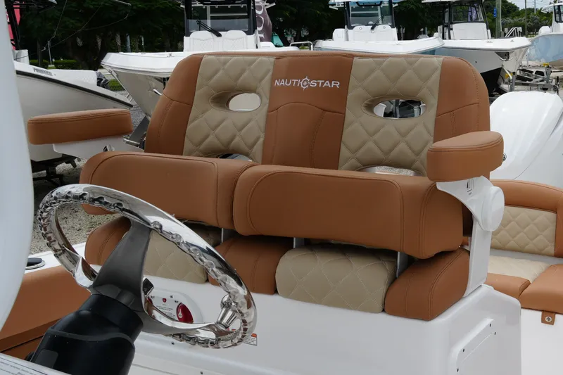  Yacht Photos Pics 2025 NauticStar 252 Legacy boat seats with luxurious tan and beige upholstery.