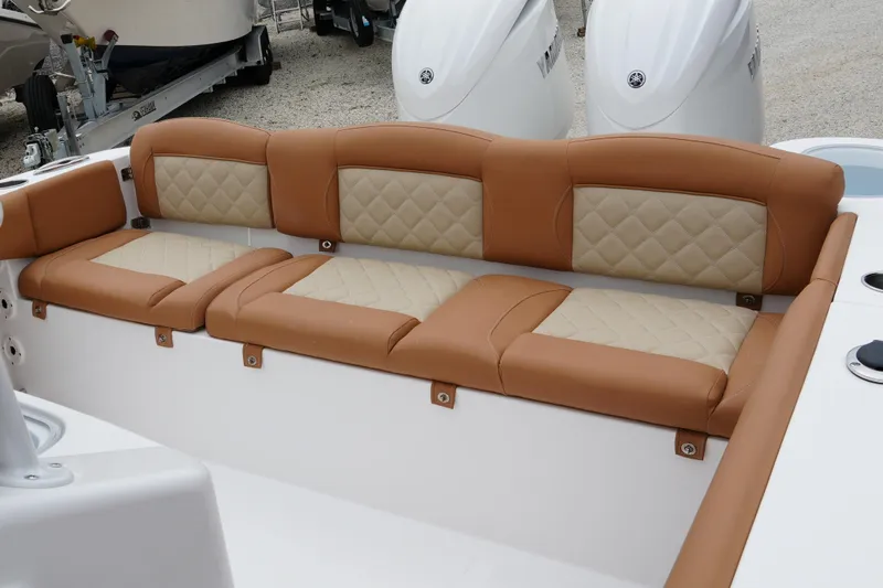  Yacht Photos Pics 2025 NauticStar 252 Legacy boat with tan and beige quilted seating.