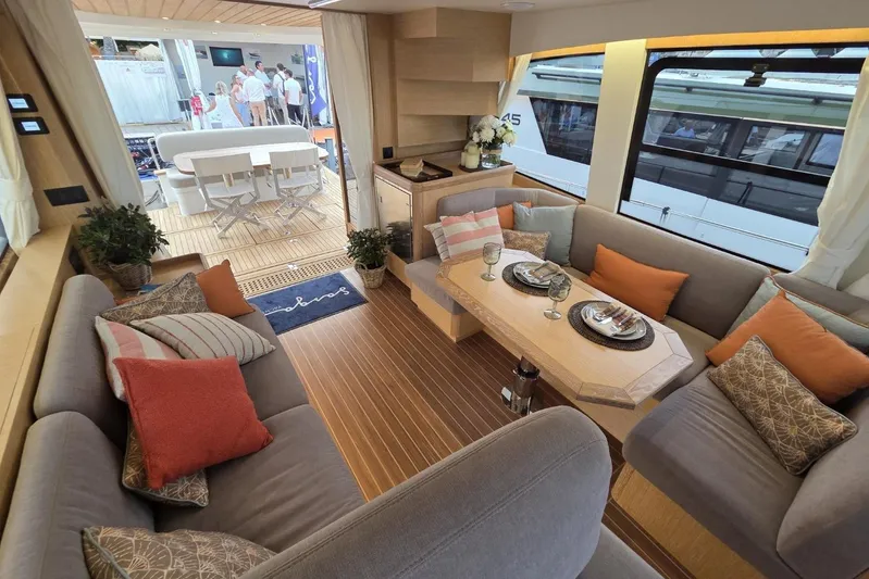  Yacht Photos Pics Luxurious interior of 2025 Sasga Yachts Menorquin 48 with elegant seating and dining area.