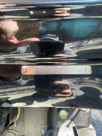  Yacht Photos Pics 2018 Chaparral 310 Signature boat with reflective surface and visible identification plate.