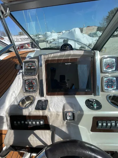  Yacht Photos Pics 2018 Chaparral 310 Signature boat dashboard with navigation system and gauges.