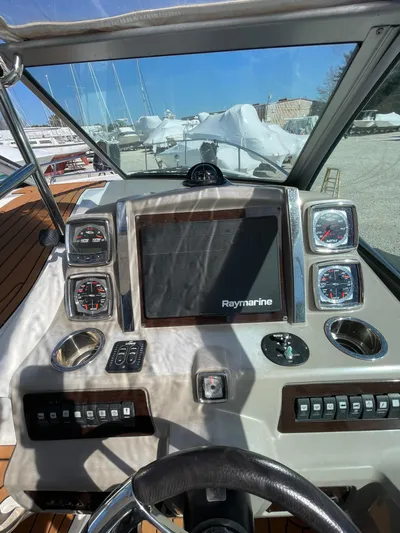  Yacht Photos Pics 2018 Chaparral 310 Signature boat dashboard with Raymarine display and gauges.
