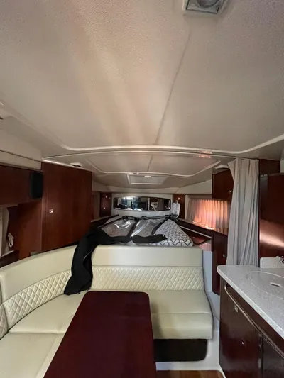  Yacht Photos Pics Interior of 2018 Chaparral 310 Signature boat with seating and cabin amenities.