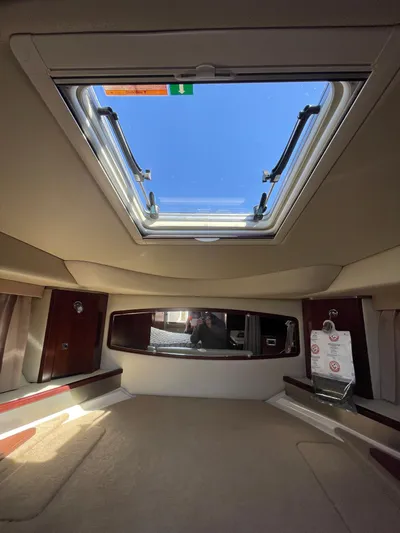  Yacht Photos Pics Interior cabin view of 2018 Chaparral 310 Signature with open skylight.