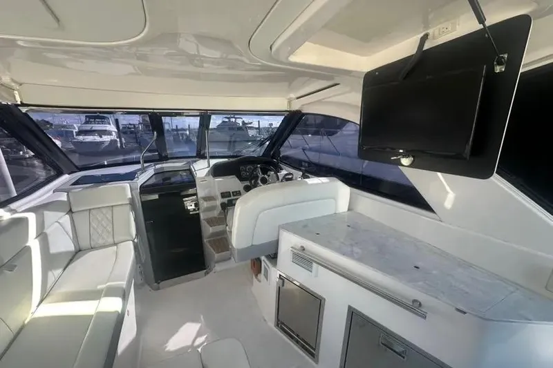  Yacht Photos Pics Interior of 2020 Regal 35 Sport Coupe yacht with modern helm and seating area.