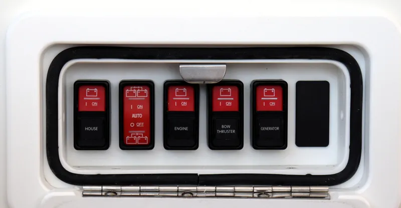 Polo Lounge Yacht Photos Pics Control panel of a 2020 Back Cove 34O boat with labeled switches.