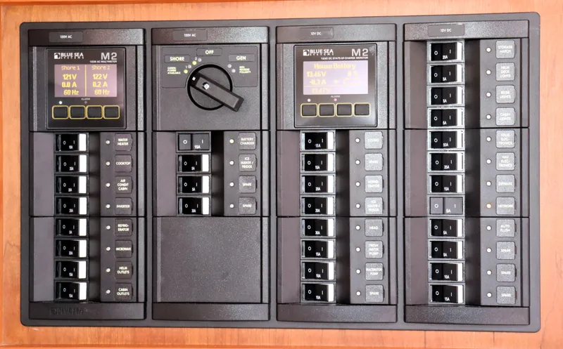 Polo Lounge Yacht Photos Pics Electrical control panel on a 2020 Back Cove 34O boat, featuring Blue Sea Systems components.