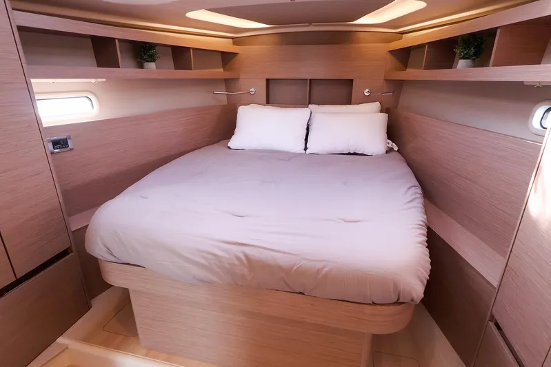  Yacht Photos Pics Luxurious interior cabin of 2025 Hanse 458 yacht with cozy bed and modern design.
