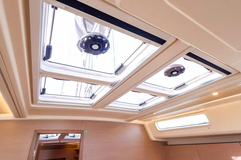  Yacht Photos Pics Interior view of 2025 Hanse 458 yacht skylights, showcasing modern design and natural lighting.