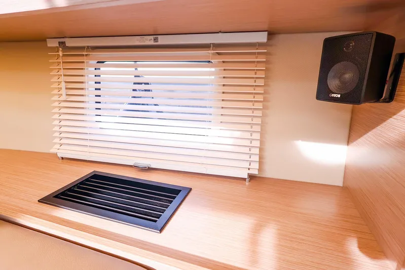  Yacht Photos Pics Interior of 2025 Hanse 458 yacht with window blinds and speaker.