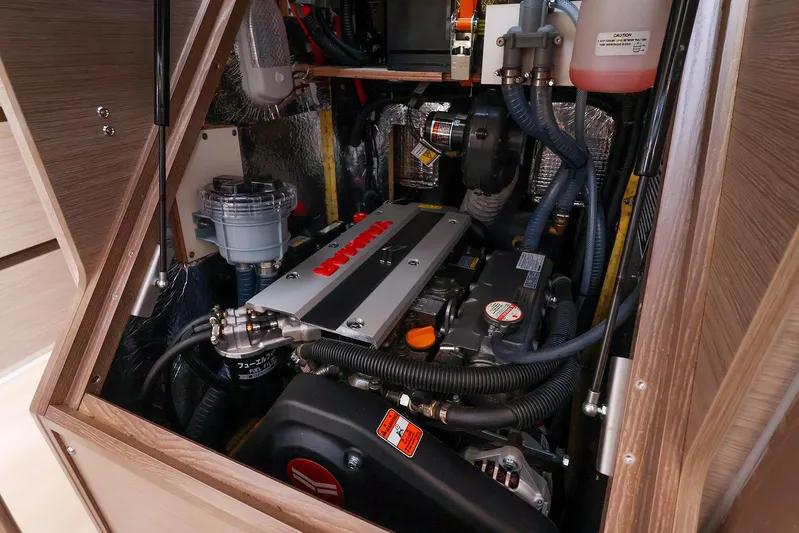  Yacht Photos Pics Engine compartment of 2025 Hanse 458 yacht, showcasing detailed mechanical components.