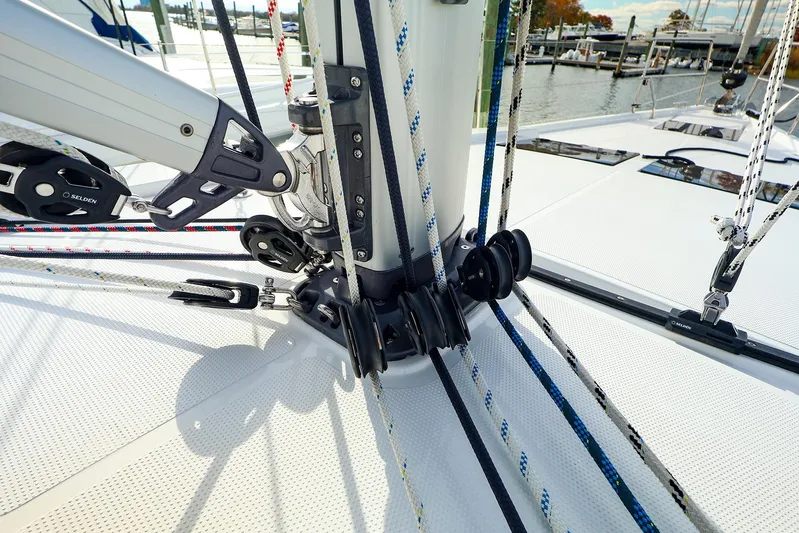  Yacht Photos Pics Close-up of rigging on a 2025 Hanse 458 sailboat, showcasing ropes and pulleys.