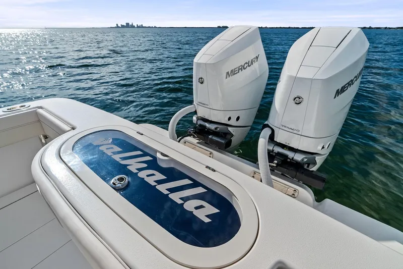 New Valhalla Boatworks V-33 Yacht Photos Pics 2026 Valhalla V-33 boat with dual Mercury engines on open water.