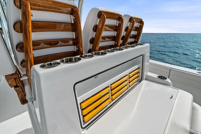 New Valhalla Boatworks V-33 Yacht Photos Pics 2026 Valhalla Boatworks V-33 interior with wooden seating and ocean view.