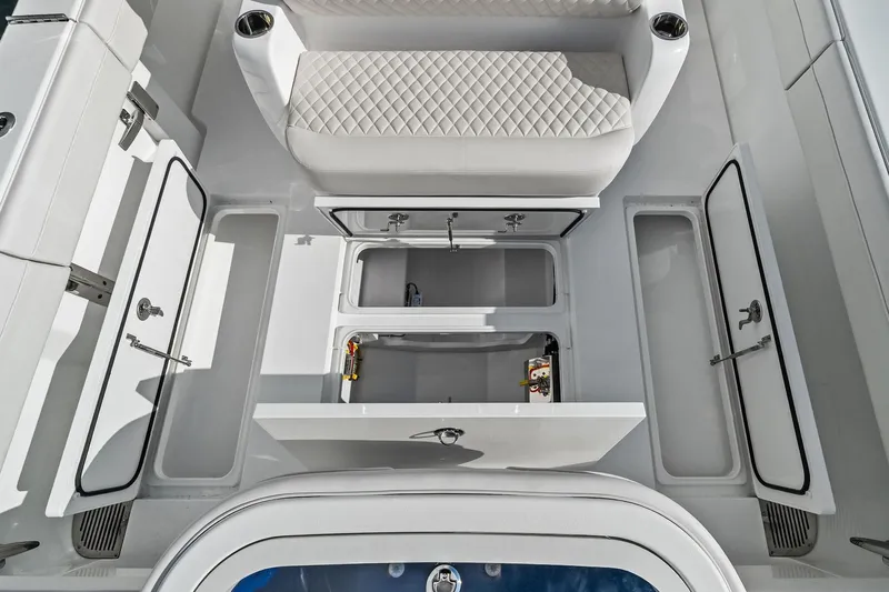 New Valhalla Boatworks V-33 Yacht Photos Pics 2026 Valhalla Boatworks V-33 interior with storage compartments and quilted seating.