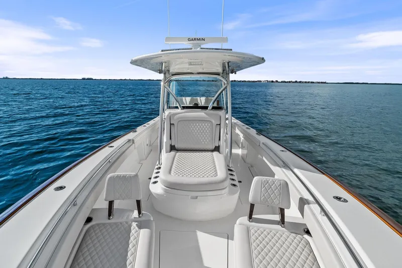 New Valhalla Boatworks V-33 Yacht Photos Pics 2026 Valhalla Boatworks V-33 on open water, showcasing luxurious seating and sleek design.