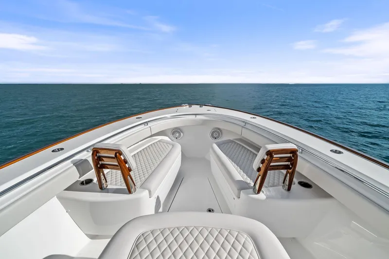 New Valhalla Boatworks V-33 Yacht Photos Pics 2026 Valhalla Boatworks V-33 bow view with luxurious seating on open water.