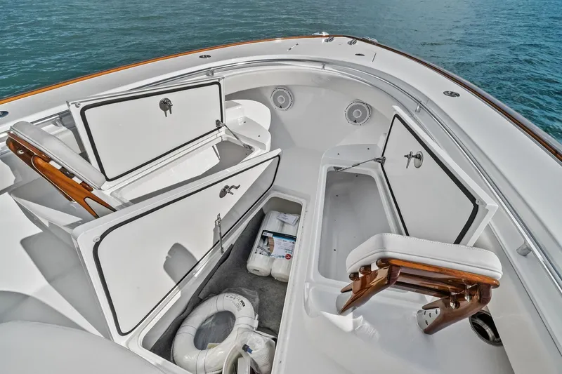 New Valhalla Boatworks V-33 Yacht Photos Pics 2026 Valhalla Boatworks V-33 deck with open storage compartments and seating.