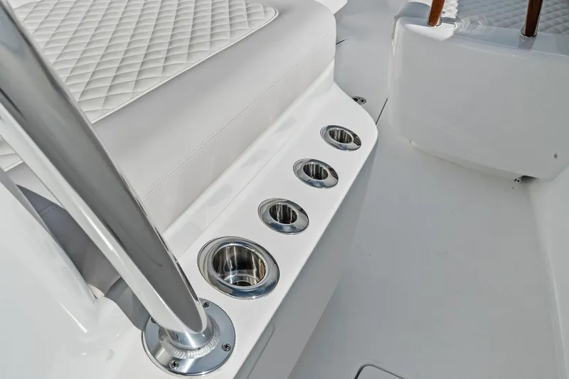 New Valhalla Boatworks V-33 Yacht Photos Pics 2026 Valhalla Boatworks V-33 interior with cup holders and quilted seating.